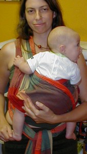 tighten1 As I lift my baby, I can see where slack appeared in the wrap.
