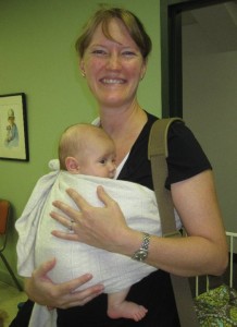 Upright in a ring sling--exact same position as with a rebozo, but this baby is on the front (tummy to tummy) instead of on the hip as in the above photo
