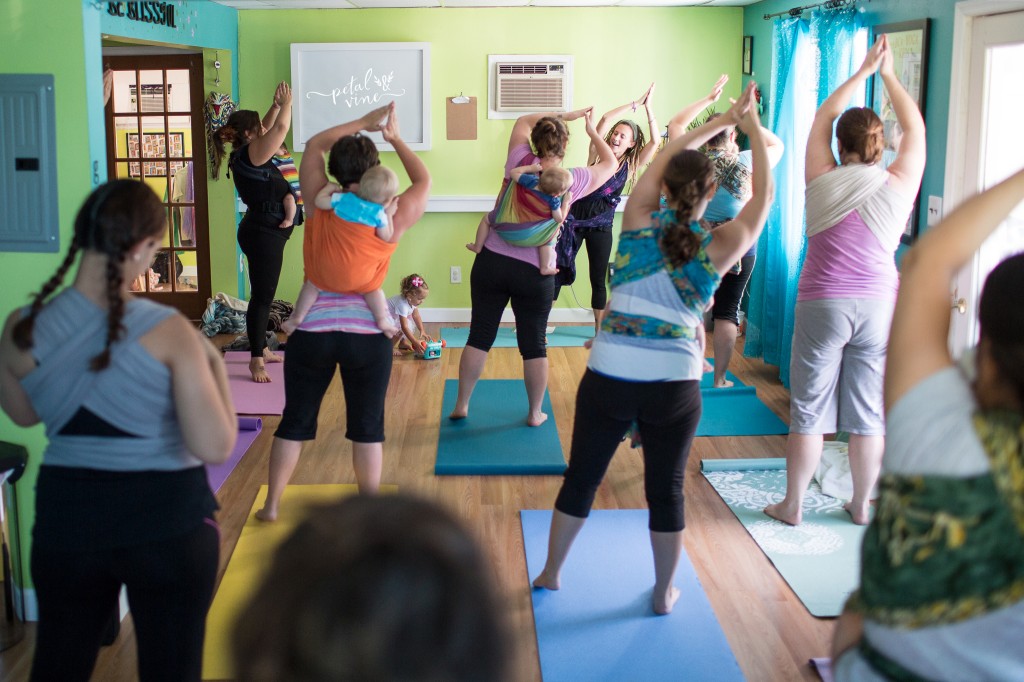 Babywearing Yoga Class for wrapped up moms and babies.