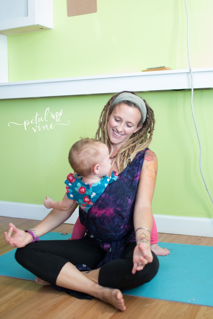 Yoga Class Teacher with toddler in Wrapsody Breeze Luna Wrap.